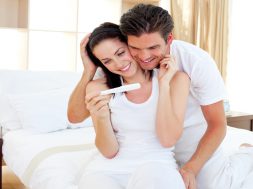 Enamoured couple finding out results of a pregnancy test