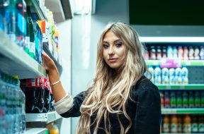 woman-standing-beside-store-shelf-3037550