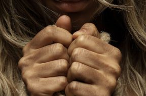 close-up-photo-of-woman-with-her-hands-tied-with-rope-1435441