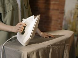 person-in-gray-dress-shirt-holding-white-book-4107183