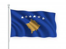 3d waving flag Kosovo on flagpole Isolated on white background.