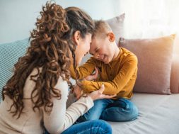 The kind of love that can't be described, only felt. Mother and her child, tickling, kidding and having fun in the couch, with spontaneous smiles. Loving my son